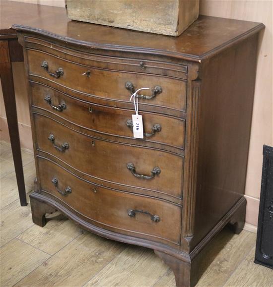 A mahogany serpentine chest of four drawers with a brushing slide W.71cm